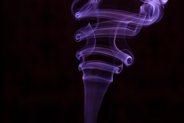 purple smoke on black background