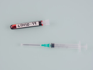 Test tube with blood sample, positive in Covid19, new coronavirus.