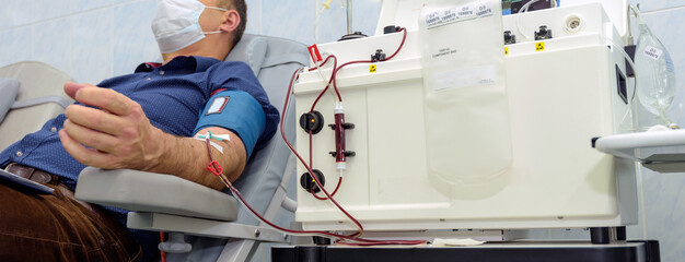Volunteers who have suffered a disease from a coronavirus, Covid - 19, donate blood.