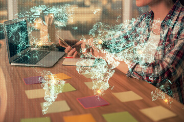 Double exposure of woman hands typing on computer and social network theme hologram drawing. People media concept.