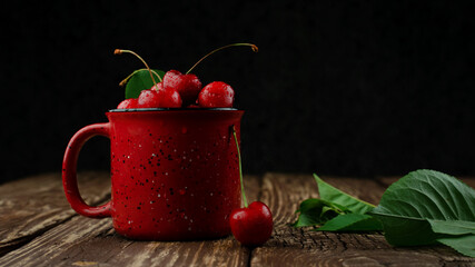 Cherries on wooden table with water drops macro background