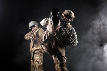 American special forces on special missions at night, two rangers in military equipment and weapons...