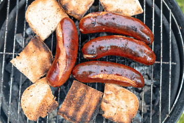 Sausages and grilled bread. Finnish traditional dish