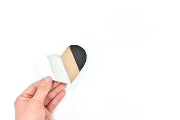 Male hands holding multicolored heart shape. Support All Lives Matter movement, stop racism and racial equality concept.