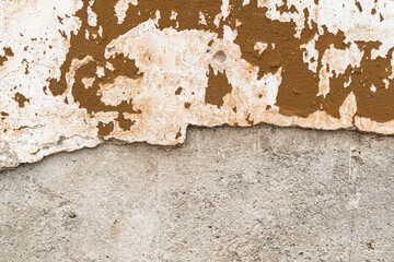 Old house wall falling apart texture background orange brown yellow white grunge space for text