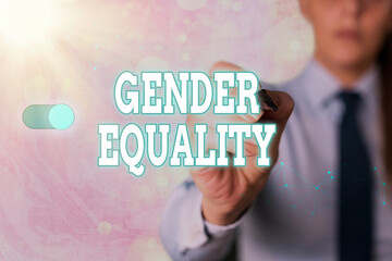 Writing note showing Gender Equality. Business concept for access to same privilege given to both...