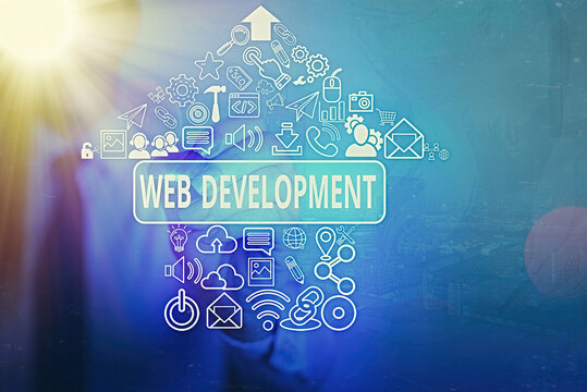 Writing note showing Web Development. Business concept for work involved in developing a website for the Internet