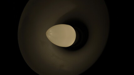 Retro lamp. Photo of the included lamp in the dark at close range