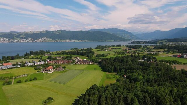 Drone show of lake zug and Rig with Cham in foreground. Switzerland landscape