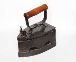 antique cast iron heavy iron with wooden handle
