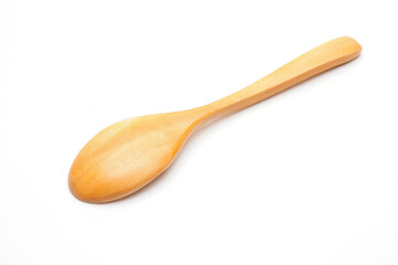 Wooden spoon on a white background