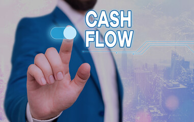 Handwriting text Cash Flow. Conceptual photo auditing the net amount of cash transferred into and...