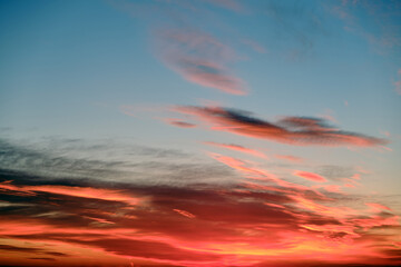 Red sunset on dark blue sky, background