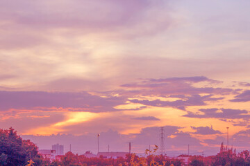 Fototapeta premium Bright orange and yellow colors sunset sky