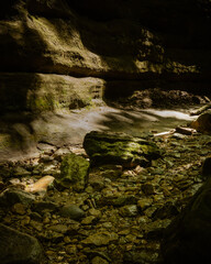 water flowing into the cave