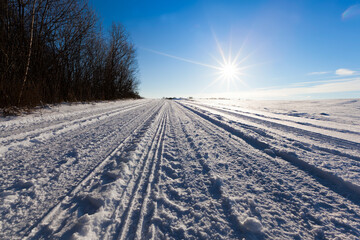 Fototapeta na wymiar winter road with ruts