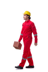 Young male mason with brick isolated on white