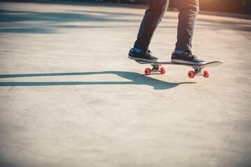 Skateboarder skateboarding at morning outdoors