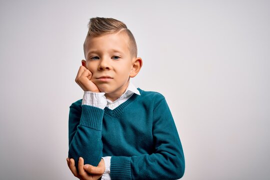 Young little caucasian kid with blue eyes standing wearing elegant clothes over isolated background thinking looking tired and bored with depression problems with crossed arms.