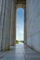 Lincoln Memorial's columns and the Washington Monument in Washington, D.C.