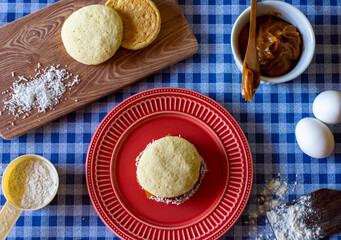 composition preparation of Uruguayan dulce de leche with grated coconut, wheat flour, eggs