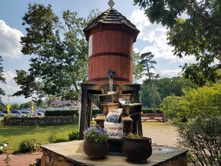 Fototapeta na wymiar water tower with water flowing