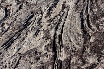 Natural sandstone rock rippled textured surface ideal as background