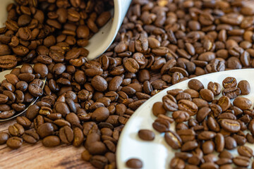 coffee beans background  with white coffee mug