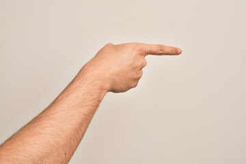 Hand of caucasian young man showing fingers over isolated white background pointing with index finger to the side, suggesting and selecting a choice