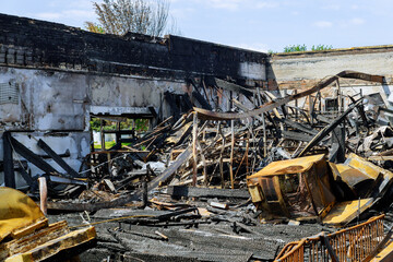 Fototapeta premium Businesses burned down damaged in Minneapolis Protest and Riots Fueled by the Death of Under Police