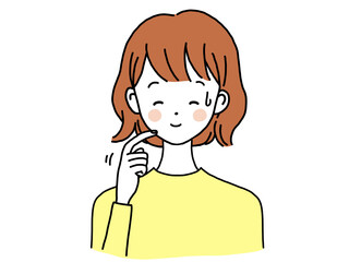 顔を指でかきながら笑顔で困る女性
