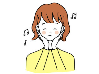 ウキウキしながら手を顔にあて微笑む女性