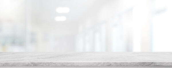 Empty white marble stone table top and blur glass window interior lobby and hall way banner mock up...