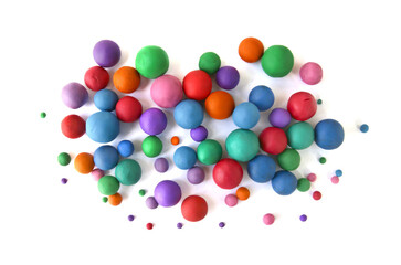 Abstract  colorful plasticine balls isolated on white background. Many balls made of modeling clay,.