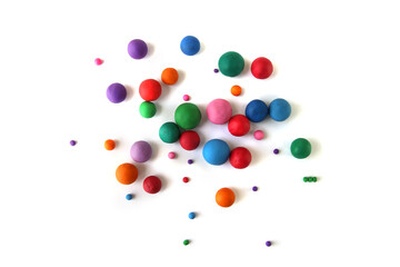 Abstract  colorful plasticine balls isolated on white background. Many balls made of modeling clay,.