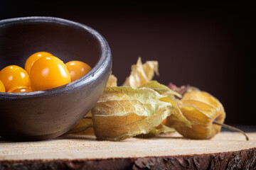 Golden Berries, Tilted clay pot with great close-up