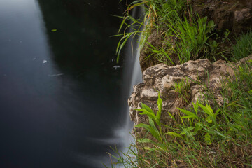 Small Forest Waterfall Ejecting into Lake Michigan