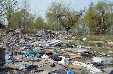 Spring landscape.Ecology of Ukraine. Nature near Ukrainian capital. Environmental contamination. Illegal junk dump. . Kiev,Ukraine