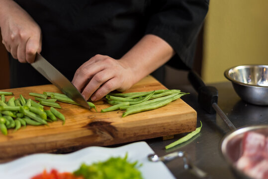 Cutting pepper in the kitchen