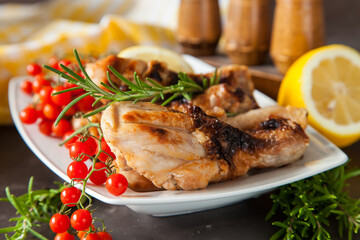 chicken legs a grill with seasonings on a table, selective focus