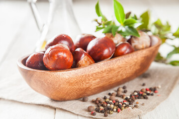 chestnuts on a table with spices, selective focus