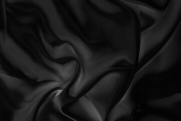 Black fabric texture for background; Abstract black fabric cloth wave or wavy folds texture material for background