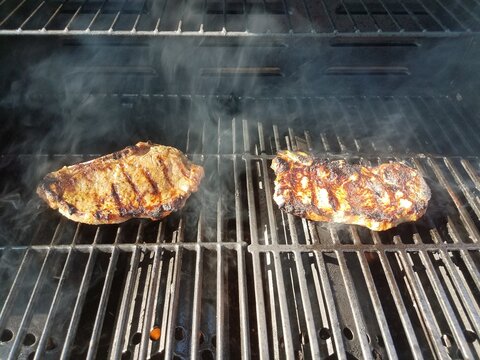 Two Steaks On A Grill