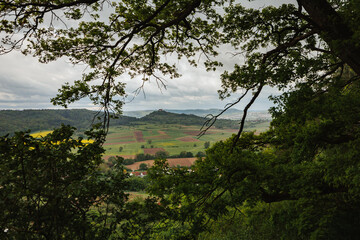 panoramic view of the chapel 'Wurmlinger Kapelle' with dramatic clouds and the landscape of Unterjesingen