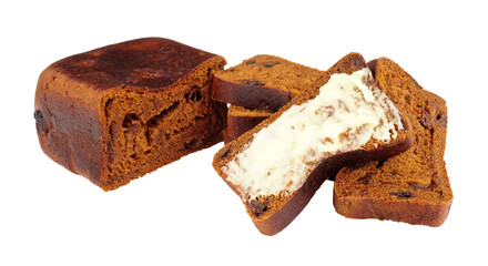 Malt fruit loaf with butter spread on one slice isolated in a white background