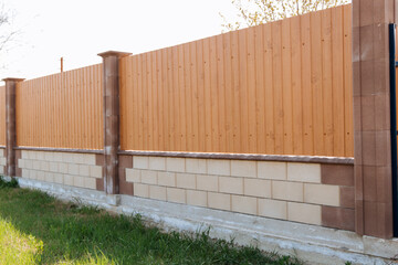 Tin fence with a beautiful textured pattern.