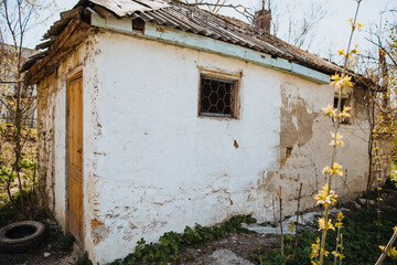 An old run down, weather beaten house that is in need of repair