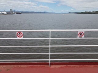 do not climb railing sign on ferry in Quebec, Canada