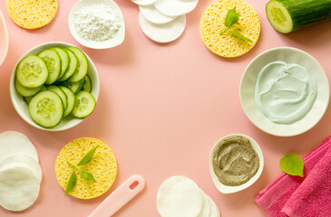 Flat lay of facial mask in bowls and care items