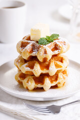 fresh baked waffles in a white plate